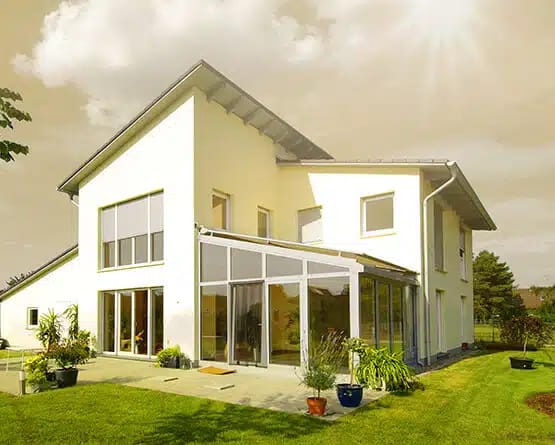 Schmidinger Sommergarten als Anbau an ein Einfamilienhaus mit Garten